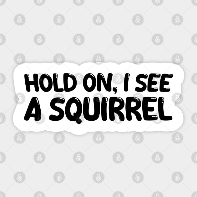 hold on i see a squirrel Sticker by mdr design